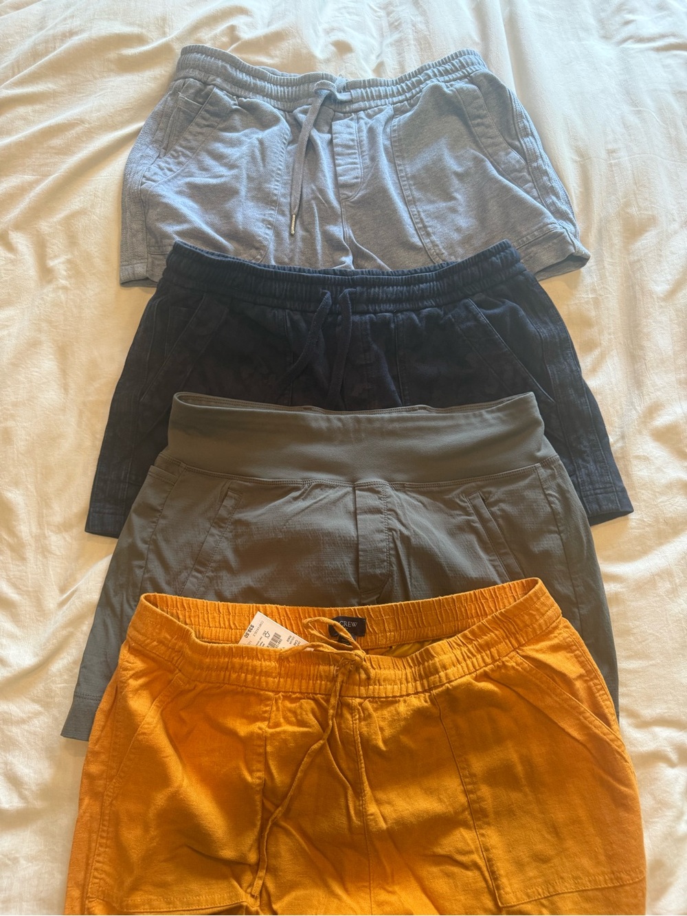 Athleta Women’s Pull-On Shorts in Mustard, Olive, Navy & Light Gray